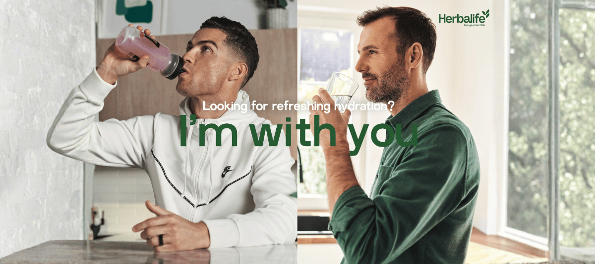 Two men drinking from bottles with 'Herbalife' branding, one indoors and one outdoors.